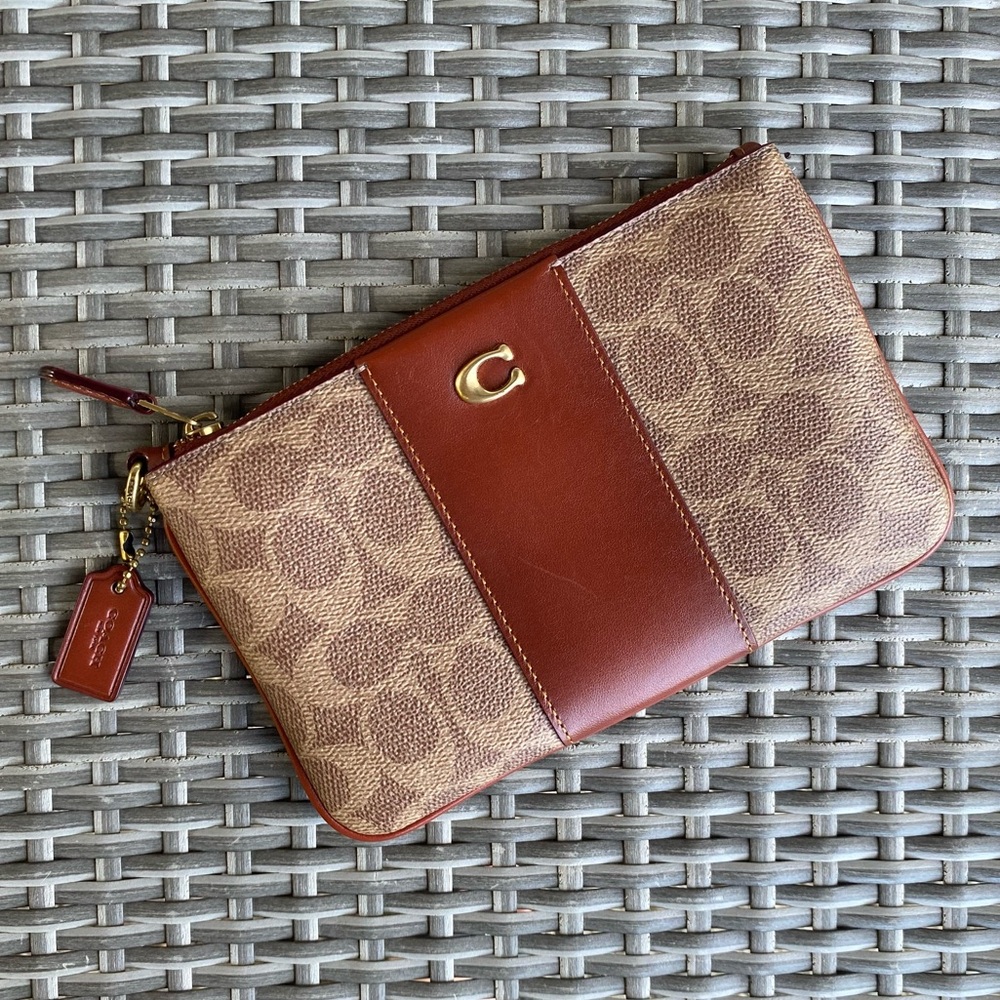 COACH essential slim leather pouch in Signature Canvas with hangtag